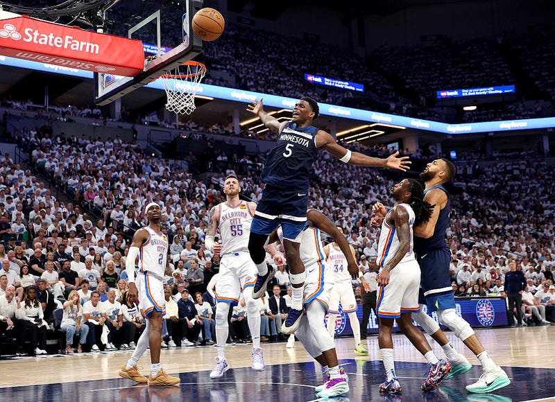 Anthony Edwards #5 of the Minnesota Timberwolves reacts to a foul against Cason Wallace #22 of the Oklahoma City Thunder during the second quarter in Game Four of the Western Conference Finals of the 2025 NBA Playoffs at Target Center on May 26, 2025 in Minneapolis, Minnesota.