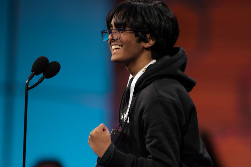 NATIONAL HARBOR, MARYLAND - MAY 28: Faizan Zaki, 13, of Dallas, Texas celebrates after correctly spelling his word in the semifinals of the 2025 Scripps National Spelling Bee at the Gaylord National Resort and Convention Center on May 28, 2025 in National Harbor, Maryland. 243 spellers from all over the globe ages 8 to 14 compete from May 27 to May 30, 2025 during the 100th anniversary of the bee. (Photo by Kayla Bartkowski/Getty Images)
