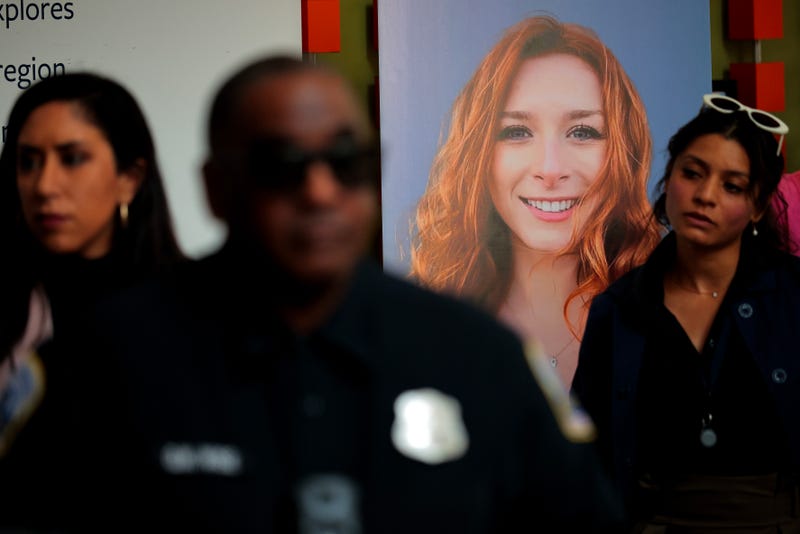 Guests gather near a photograph of Sarah Lynn Milgrim during a remembrance and reopening ceremony at the Lillian and Albert Small Capital Jewish Museum on May 29, 2025 in Washington, DC. 