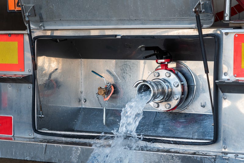 Volunteer fire official charged with DUI after tanker crash with child on board