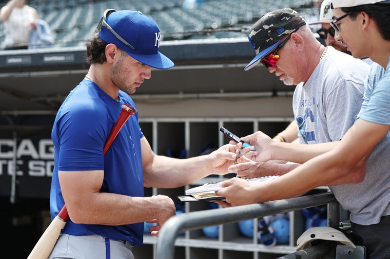 Jac Caglianone #14 of the Kansas City Royals signs autographs before a game against the Chicago White Sox at Rate Field on June 7, 2025 in Chicago, Illinois