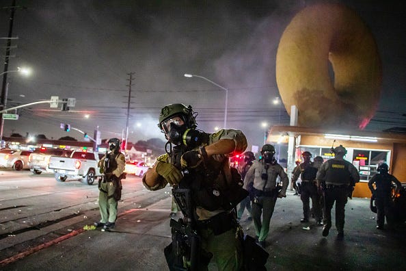 Protesters and officers in LA