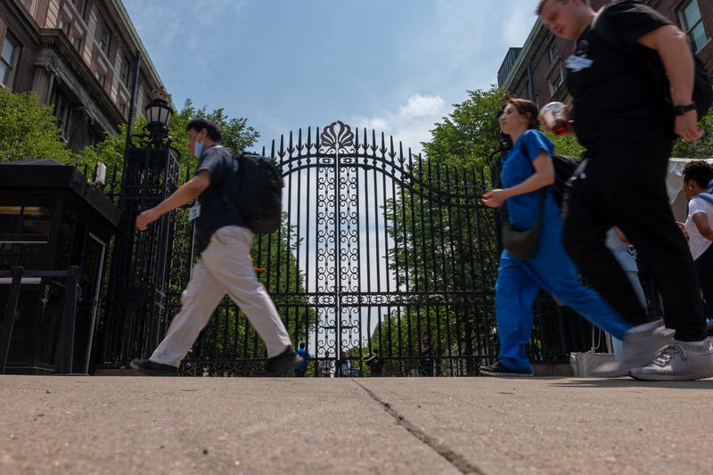Pedestrians walk by Columbia University in Upper Manhattan on June 5, 2025
