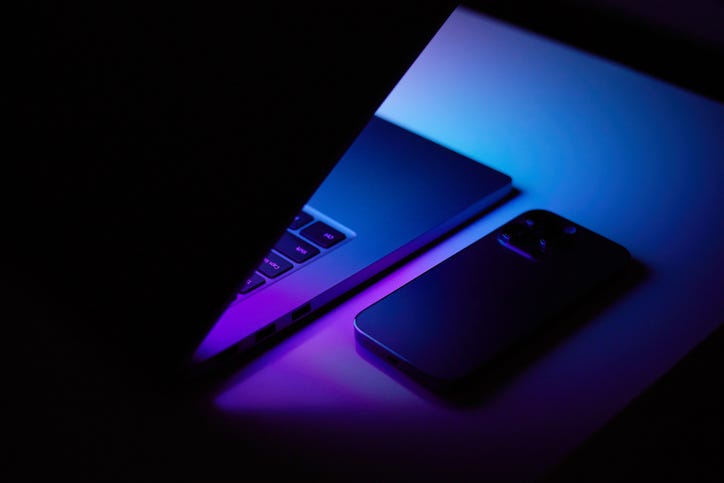 laptop with light from screen