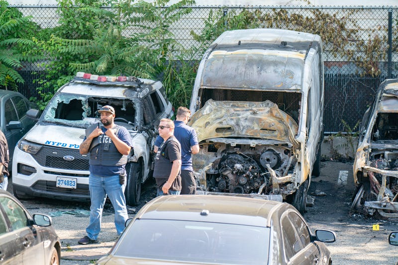 Eleven NYPD vehicles were burnt after an arsonist set them on fire while they were parked in a parking lot bounded by Central Avenue and Dekalb Avenue in Brooklyn on Thursday, June 12, 2025