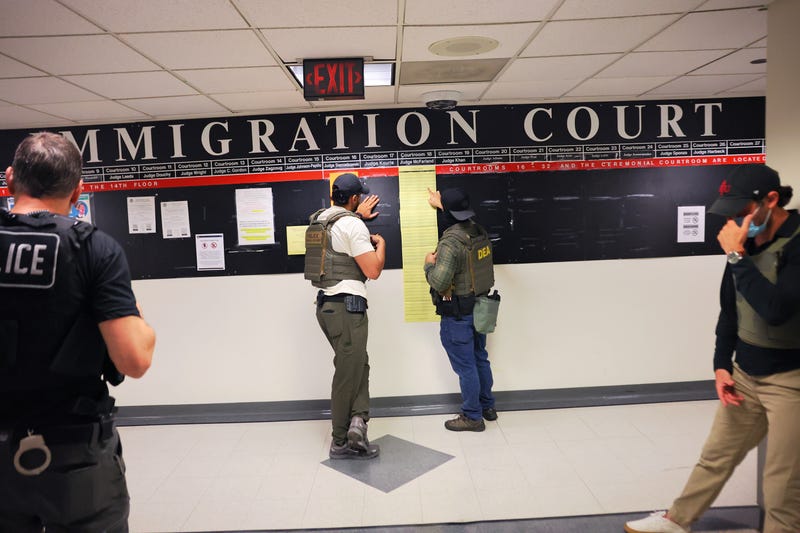 Federal agents patrol the halls of immigration court at the Jacob K. Javitz Federal Building on June 9, 2025