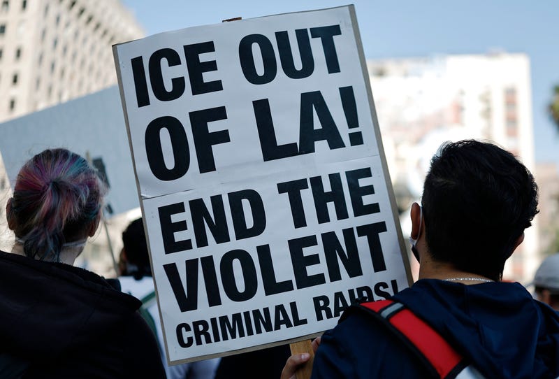 Protesters demonstrate before marching downtown as protests against ICE immigration raids continue in the city on June 11, 2025 in Los Angeles, California.