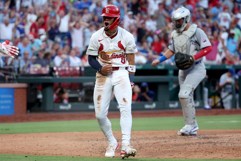 Masyn Winn #0 of the St. Louis Cardinals reacts after scoring a run from second base on a sacrifice fly by Alec Burleson during the fourth inning against the St. Louis Cardinals at Busch Stadium on June 24, 2025 in St Louis, Missouri. 