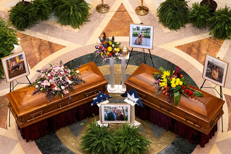 DFL Rep. Melissa Hortman, her husband Mark Hortman, and their dog Gilbert lie in state in the rotunda of the Capitol building on June 27, 2025 in St. Paul, Minnesota.