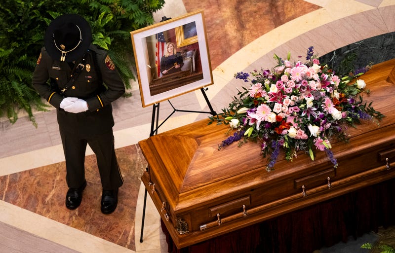 A Minnesota Conservation Officer stands guard as DFL Rep. Melissa Hortman, her husband Mark Hortman, and their dog Gilbert lie in state in the rotunda of the Capitol building on June 27, 2025 in St. Paul, Minnesota. 