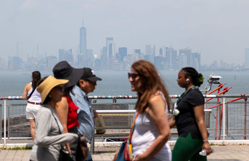 Manhattan is shrouded in an afternoon haze seen from Staten Island on June 23, 2025 in New York City. Temperatures in New York City reached into the high 90's with a heat index of over 100 degrees as the first heat wave of the year moves across parts of the Midwest and East Coast. 