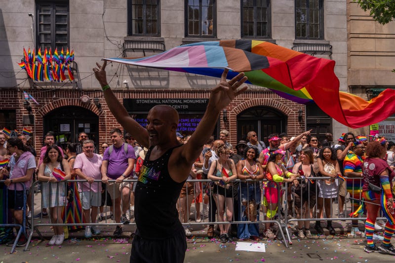 Crowds watch outside of Stonewall National Monument as people take part in the 2025 NYC Pride March on June 29, 2025