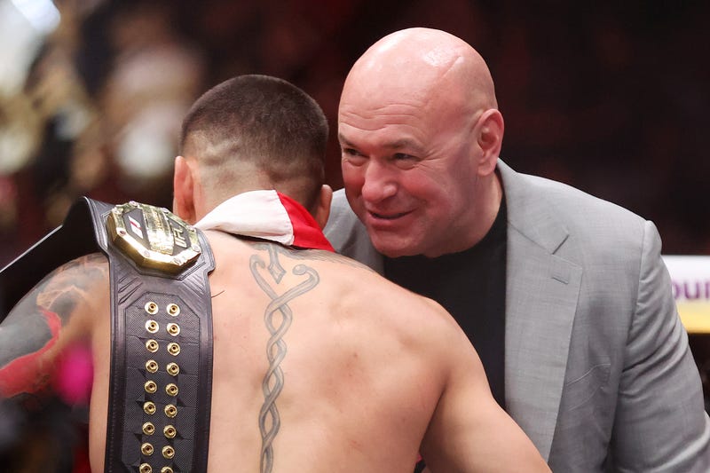  Ilia Topuria of Georgia meets UFC chief executive officer Dana White after defeating Charles Oliveira of Brazil to win the lightweight main event title during UFC 317 at T-Mobile Arena on June 28, 2025 in Las Vegas, Nevada.