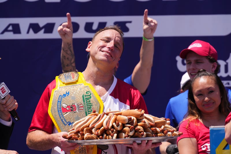 NEW YORK, NEW YORK - JULY 4: Joey Chestnut wins the men's competition at Nathan's Annual Hot Dog Eating Contest on July 4, 2025 in New York City. Joey Chestnut makes his return to the Nathan's Famous 4th of July Hot Dog Eating Contest to compete for a 17th win after missing the 2024 event due to a sponsorship dispute with Major League Eating. (Photo by Adam Gray/Getty Images)