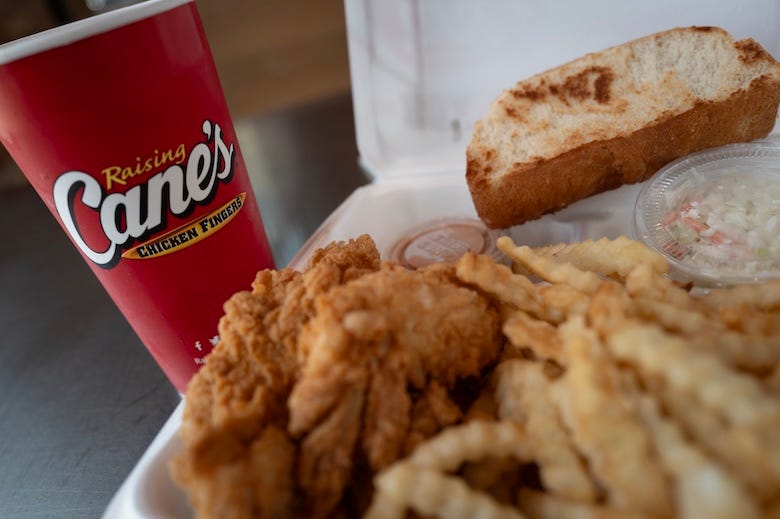 Order of tenders, fries, bread, and coleslaw from Raising Cane’s