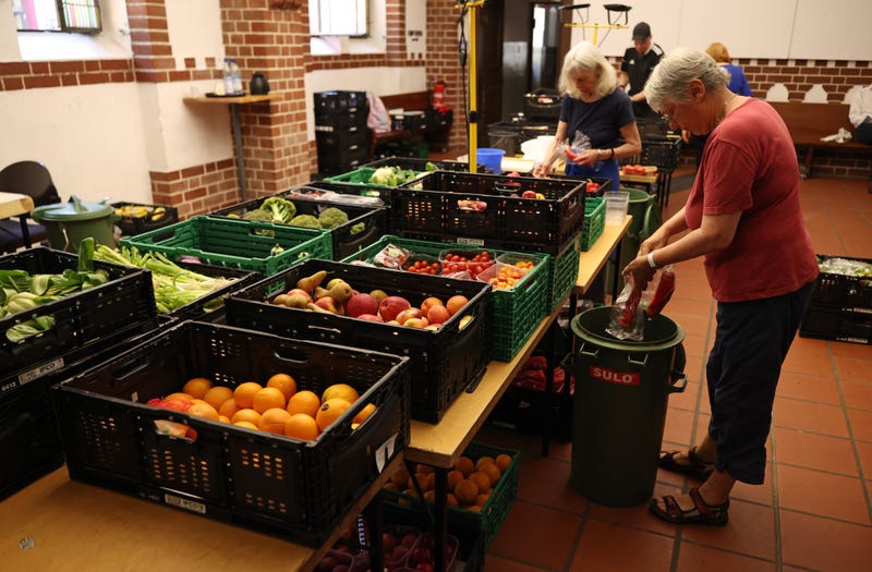 People receive assistance at a local food bank