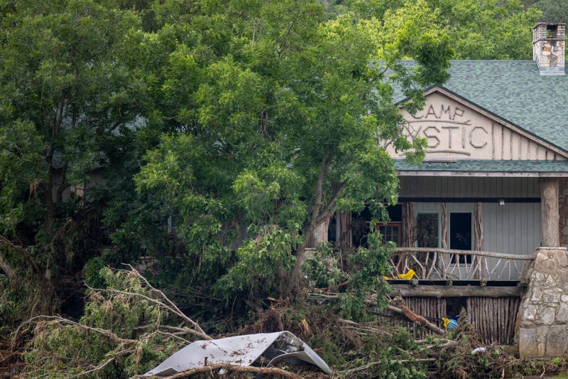 HUNT, TEXAS - JULY 07: Debris is piled up at the entrance to Camp Mystic on July 07, 2025 in Hunt, Texas. Heavy rainfall caused severe flash flooding along the Guadalupe River in central Texas, leaving more than 80 people reported dead, including children attending the camp. (Photo by Brandon Bell/Getty Images)