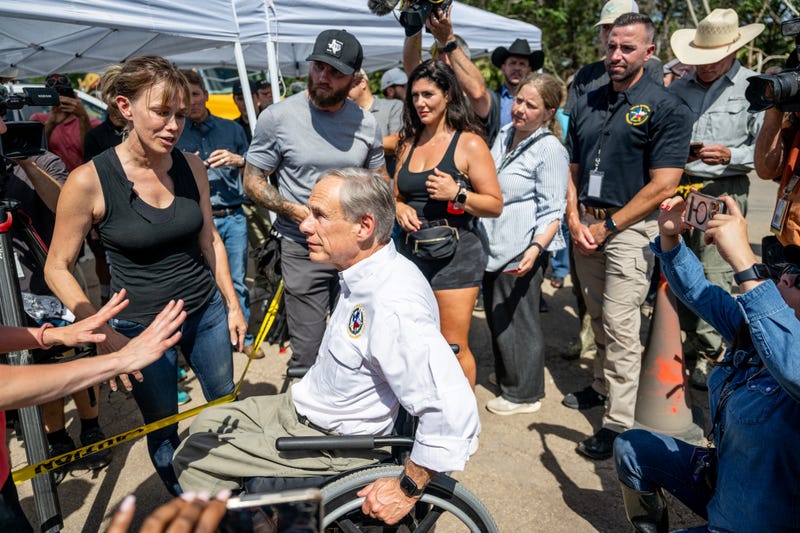 HUNT, TEXAS - JULY 08: Gov. Greg Abbott speaks with community members and volunteers during a news conference on July 08, 2025 in Hunt, Texas. Gov. Abbott announced that more than 160 people are still missing after deadly floods early Friday. Last week, heavy rainfall caused severe flash flooding along the Guadalupe River in central Texas, leaving more than 100 people reported dead, including children attending Camp Mystic. (Photo by Brandon Bell/Getty Images)