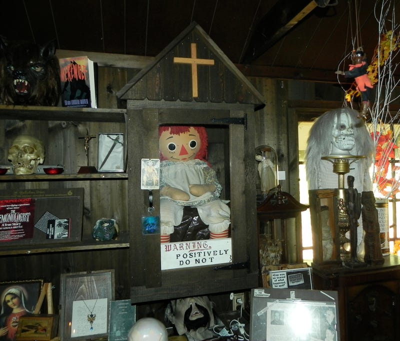 The Annabelle Raggedy Ann doll sits in a case in the Warren's Occult Museum.