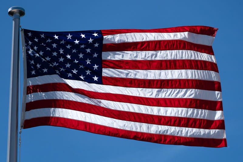 Aurora Mayor John Laesch is standing by his decision to keep city flags at full staff, despite an order from President Donald Trump to lower flags nationwide in honor of slain conservative activist Charlie Kirk.