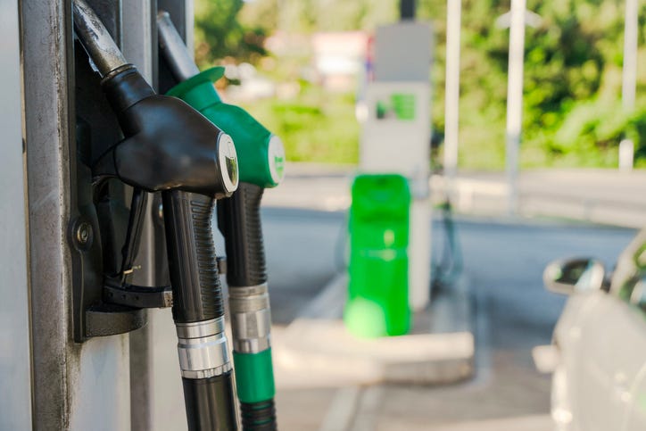 Modern gas station with diesel and petrol nozzles, capturing the essence of fuel supply for everyday travel and convenience