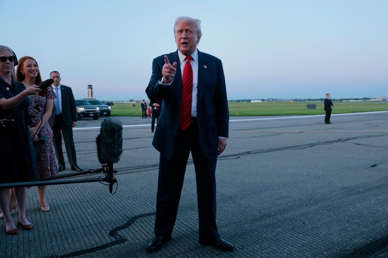 President Donald Trump speaks to reporters near Air Force One at the the Lehigh Valley International Airport on August 3, 2025