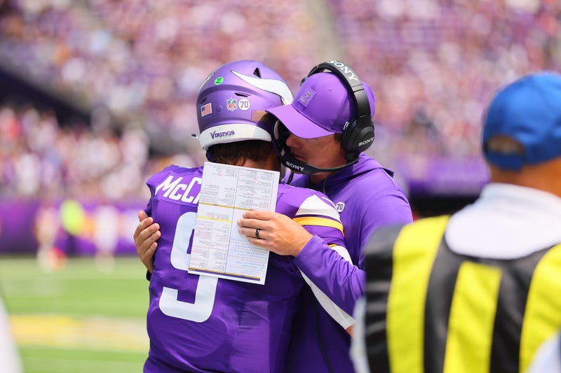 J.J. McCarthy #9 and Head Coach Kevin O'Connell of the Minnesota Vikings talk before the NFL Preseason 2025 game between Houston Texans and Minnesota Vikings at U.S. Bank Stadium on August 9, 2025 in Minneapolis, Minnesota. 
