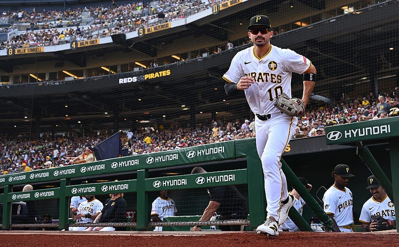 Bryan Reynolds running onto the field