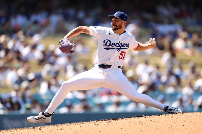 Alex Vesia #51 of the Los Angeles Dodgers pitches against the St. Louis Cardinals during the eighth inning at Dodger Stadium on August 06, 2025 in Los Angeles, California. 
