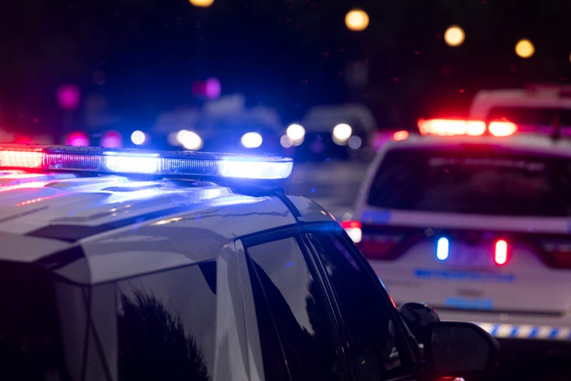 Cop cars with lights on