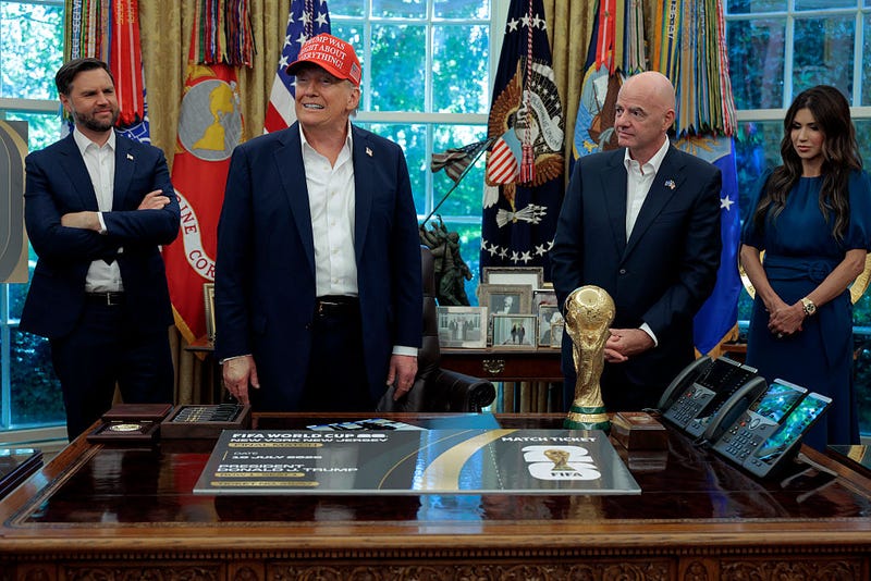 President Trump with Vice President J.D. Vance, FIFA president Gianni Infanito and Homeland Security Secretary Kristi Noem at the White House August 22, 2025.
