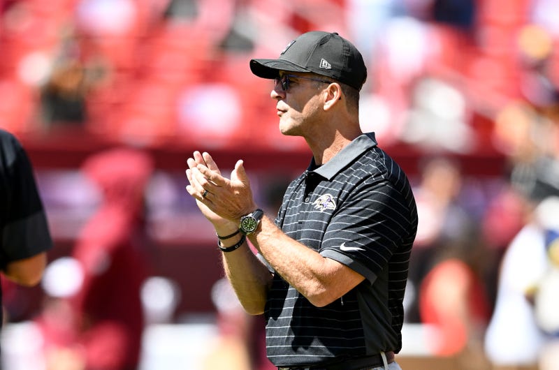 Head coach John Harbaugh of the Baltimore Ravens watches the teams warm up before the NFL Preseason 2025 game against the Washington Commanders at Northwest Stadium on August 23, 2025 in Landover, Maryland.