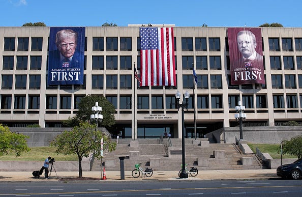 Images of U.S. President Donald Trump and former President Theodore Roosevelt are displayed on the side of the U.S. Department of Labor on August 25, 2025 in Washington, DC. The Trump administration has deployed federal officers and the National Guard to the District in order to place the DC Metropolitan Police Department under federal control and assist in crime prevention in the nation's capital. (Photo by Kevin Dietsch/Getty Images)