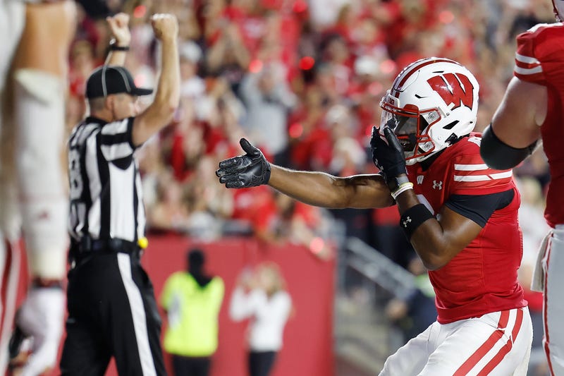 Vinny Anthony II #8 of the Wisconsin Badgers celebrates a three-yard touchdown catch in the third quarter against the Miami (OH) Redhawks at Camp Randall Stadium on August 28, 2025 in Madison, Wisconsin