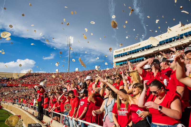 LUBBOCK, TEXAS - AUGUST 30: Texas Tech students throw tortillas for the opening kickoff during the first half of the game between the Texas Tech Red Raiders and the Arkansas-Pine Bluff Golden Lions at Jones AT&T Stadium on August 30, 2025 in Lubbock, Texas. (Photo by John E. Moore III/Getty Images)