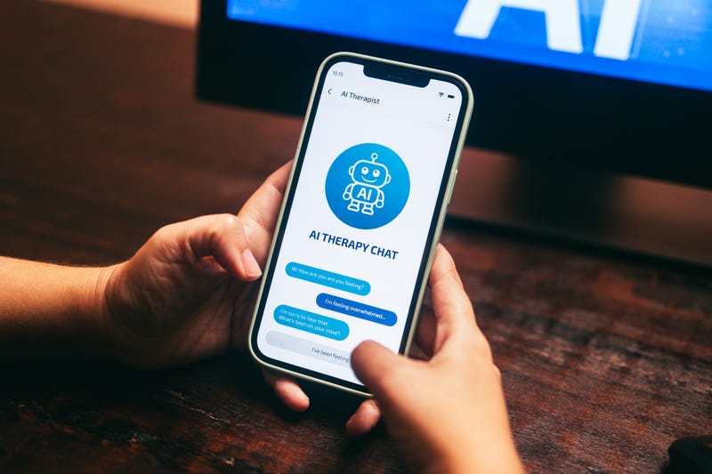 person using their phone to access ai therapy chat