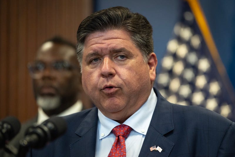 CHICAGO, ILLINOIS - SEPTEMBER 02: Illinois Governor JB Pritzker speaks to the press as Chicago Mayor Brandon Johnson listens on September 02, 2025 in Chicago, Illinois. They called the press conference to address President Donald Trump's threat to bring the National Guard and an influx of ICE agents into the city to help control crime. (Photo by Scott Olson/Getty Images)