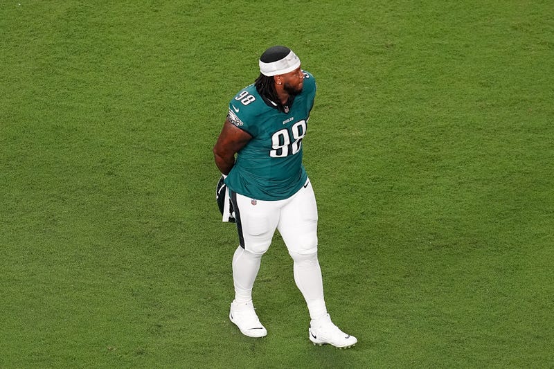 Eagles defensive tackle Jalen Carter walks off the field after getting ejected for an unsportsmanlike conduct penalty against the Dallas Cowboys during the first quarter in the game at Lincoln Financial Field on Sept. 4, 2025.