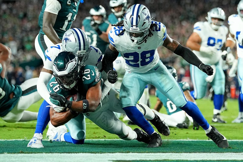 PHILADELPHIA, PENNSYLVANIA - SEPTEMBER 04: Saquon Barkley #26 of the Philadelphia Eagles scores a 10 yard touchdown against the Dallas Cowboys during the second quarter in the game at Lincoln Financial Field on September 04, 2025 in Philadelphia, Pennsylvania. (Photo by Mitchell Leff/Getty Images)