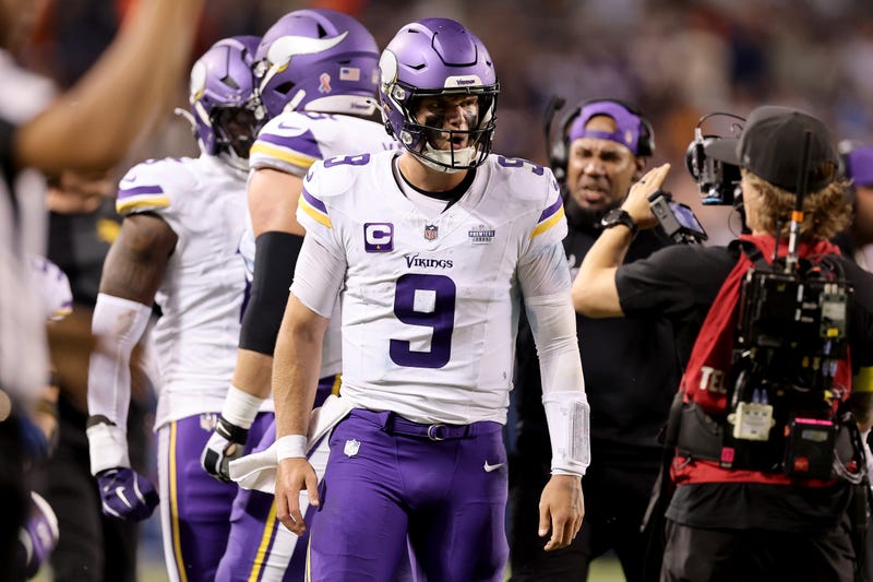 J.J. McCarthy #9 of the Minnesota Vikings reacts after a successful two point conversion during the game against the Chicago Bears at Soldier Field on September 08, 2025 in Chicago, Illinois. 