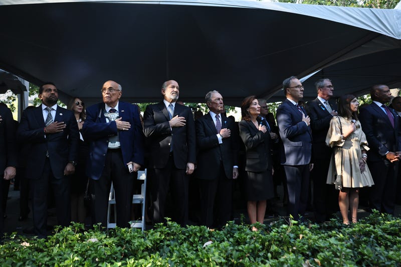 FBI Director Kash Patel, former NYC Mayor Rudy Giuliani, U.S. Secretary of Commerce Howard Lutnick, Former NYC Mayor Michael Bloomberg, Gov. Kathy Hochul, William Hochul Jr., New Jersey Gov. Phil Murphy, Tammy Murphy and NYC Mayor Eric Adams attend the annual 9/11 Commemoration Ceremony at the National 9/11 Memorial and Museum on September 11, 2025 in New York City