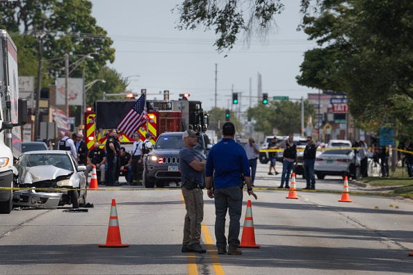 Investigators collect evidence after a man crashed his vehicle after being fatally shot during a confrontation with ICE officers on September 12, 2025 in Franklin Park, Illinois. The Chicago area has seen a surge in ICE activity recently, part of the Trump administration's crackdown on undocumented immigrants in the area dubbed "Operation Midway Blitz". (Photo by Scott Olson/Getty Images)