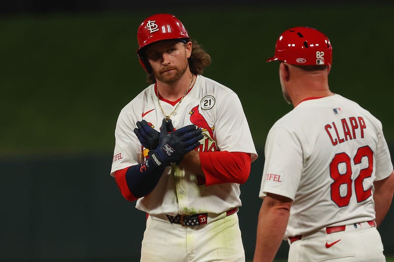 Brendan Donovan #21 of the St. Louis Cardinals looks to th dugout after driving in a run against the Cincinnati Reds in the seventh inning at Busch Stadium on September 15, 2025 in St Louis, Missouri. As a Roberto Clemente Award nominee Donovan is wearing the #21 for this game only.