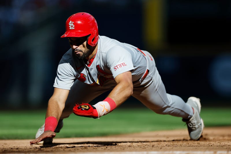 José Fermín #15 of the St. Louis Cardinals dives safely back to first base in the seventh inning against the Milwaukee Brewers at American Family Field on September 14, 2025 in Milwaukee, Wisconsin.