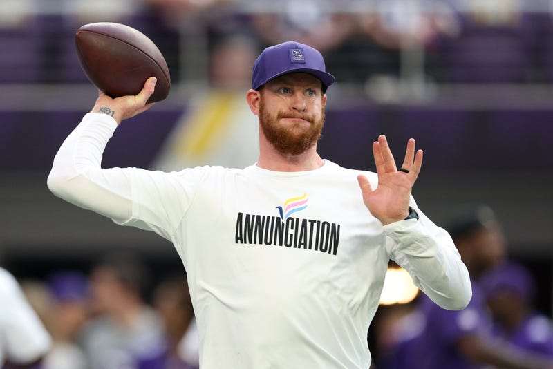  Carson Wentz #11 of the Minnesota Vikings warms up against the Atlanta Falcons before the game at U.S. Bank Stadium on September 14, 2025 in Minneapolis, Minnesota. 