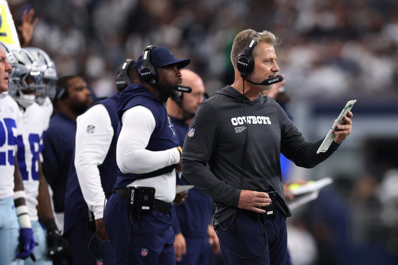 Defensive coordinator Matt Eberflus of the Dallas Cowboys makes adjustments during the game against the New York Giants at AT&T Stadium on Sep. 14, 2025 in Arlington, Texas.