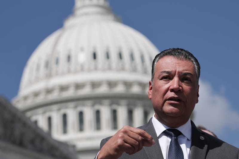 Senator Alex Padilla standing in front of white house
