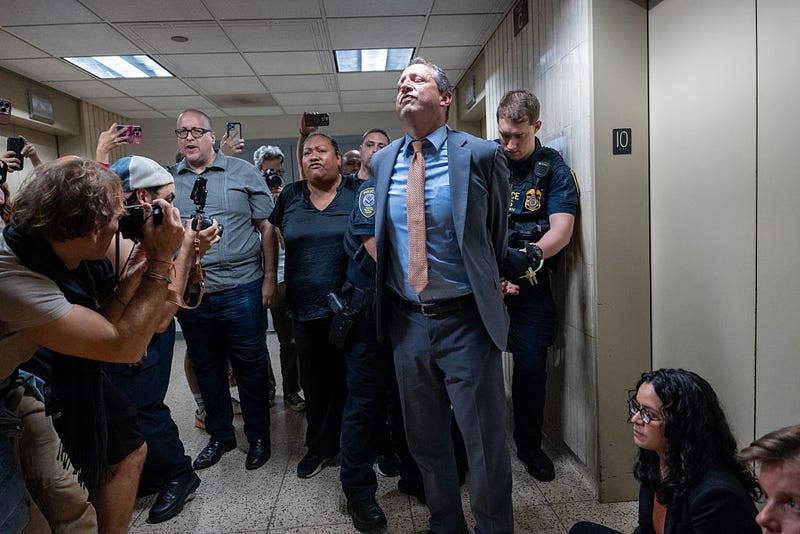 Comptroller Brad Lander is arrested as he joins 11 local elected officials inside lower Manhattan’s federal building, demanding access to an Immigration and Customs Enforcement (ICE) holding area on the building’s 10th floor on September 18, 2025, in New York City.