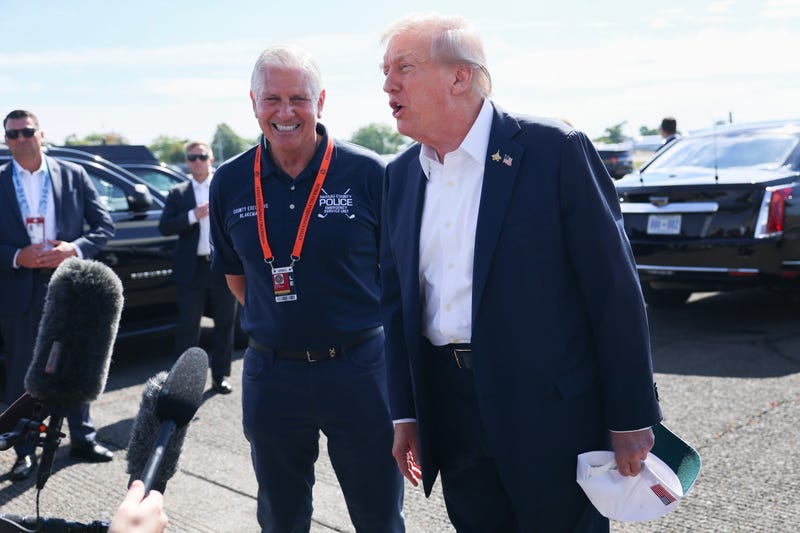 President Trump is greeted by Bruce Blakeman after arriving at the Republic Airport on Air Force One on September 26, 2025 in Farmingdale