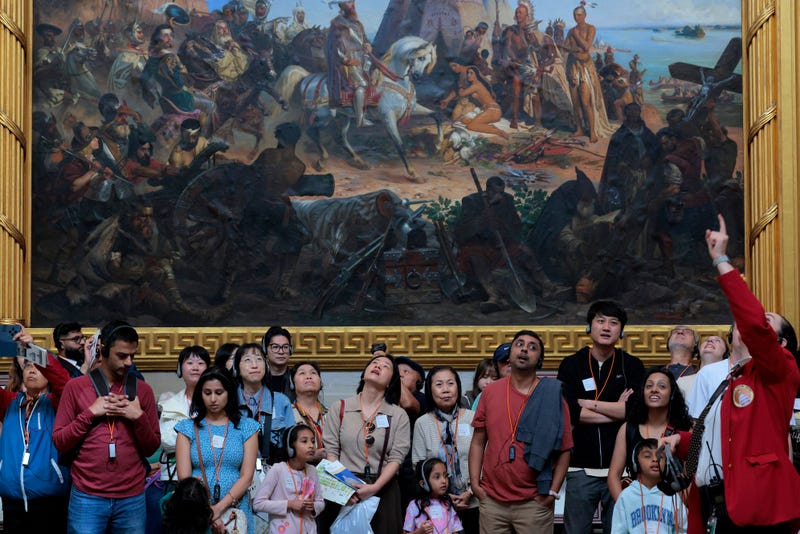Tour guides lead guests through the history of the U.S. Capitol Rotunda on 9/30/25 in Washington, DC. If lawmakers fail to reach a bipartisan compromise the the federal government will shutdown at midnight, ending non-essential work possibly including tours of the Capitol building.  